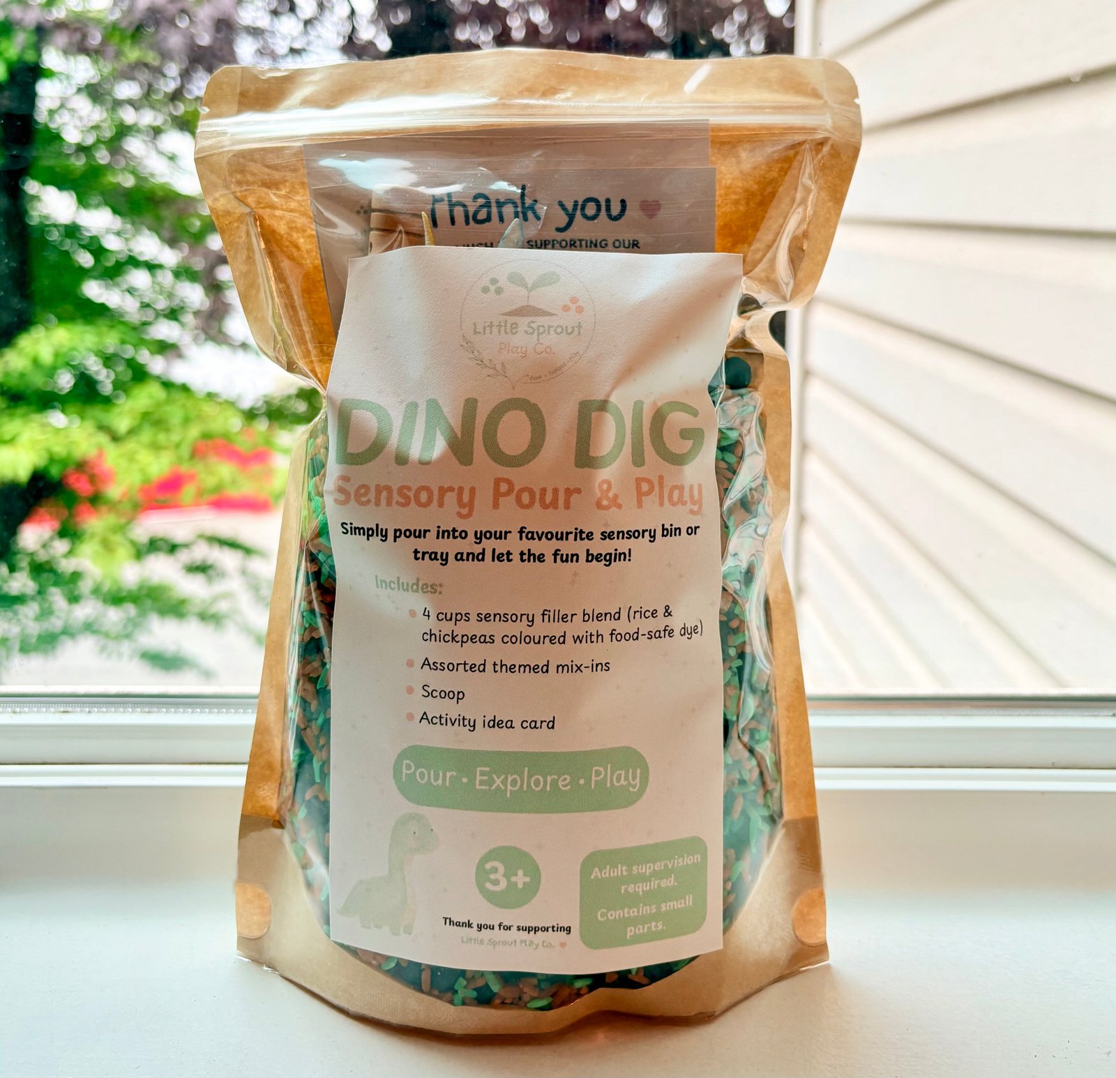Dino Dig ready-to-pour dinosaur sensory play kit in a resealable bag