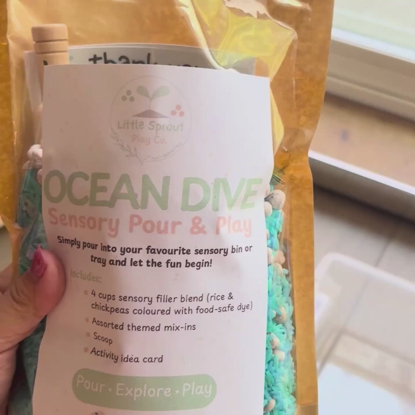 video of sensory play pouch being dumped out into sensory bin. 